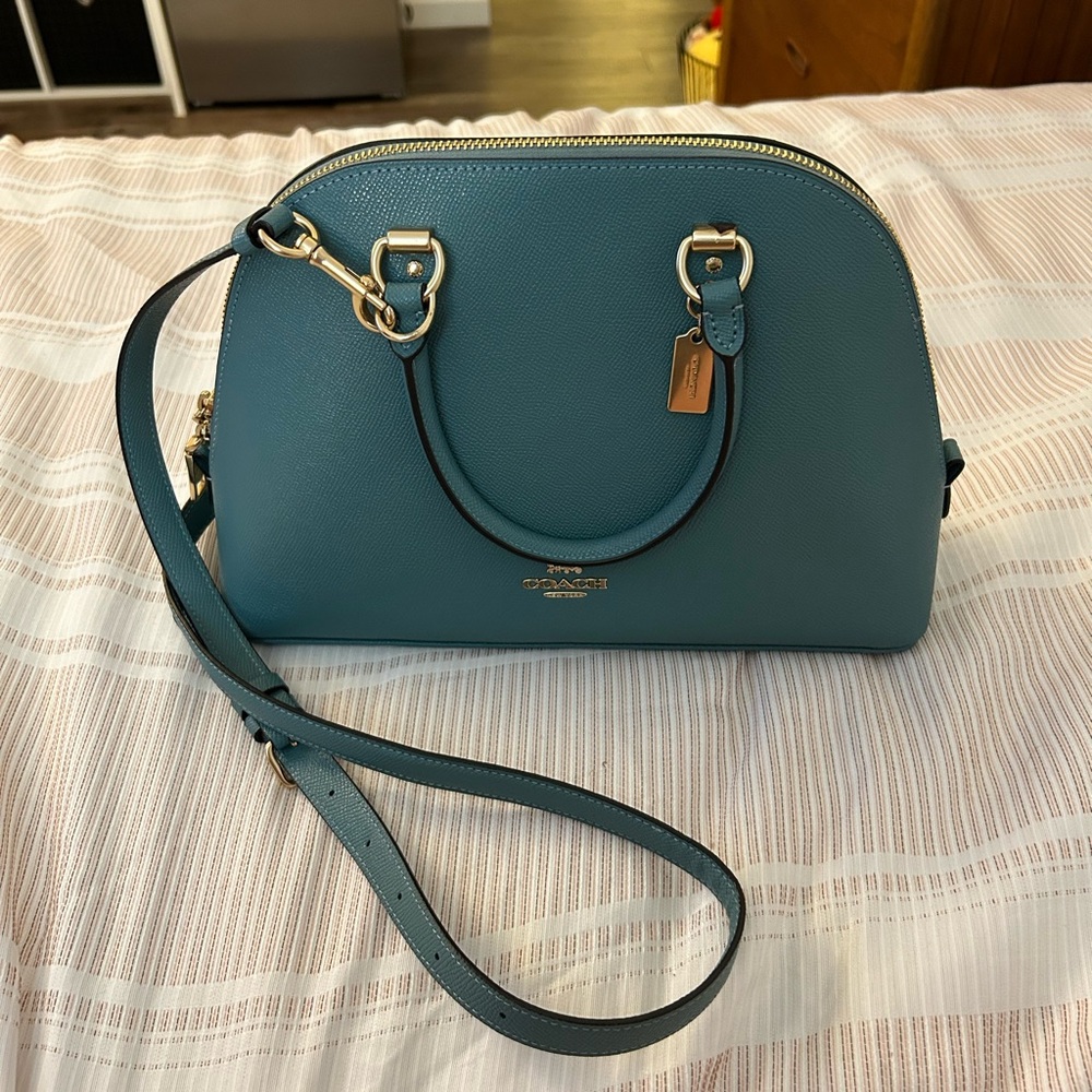 Teal coach purse